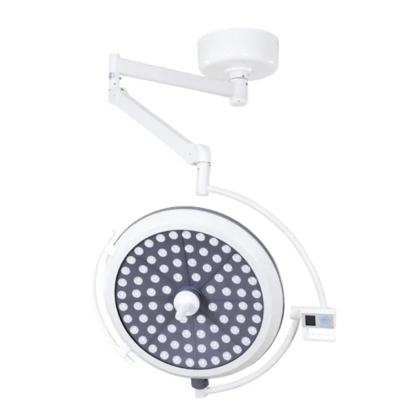 Surgeon adjusting 160-280mm spot diameter on medical operating lamp