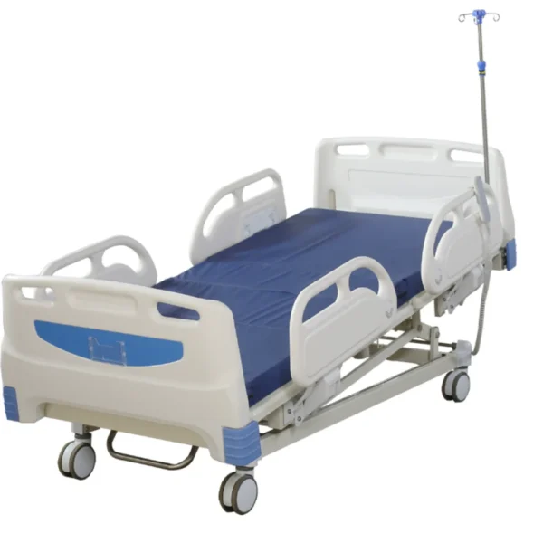 Electric hospital bed in low position (45cm) with backlight remote, underbed storage tray, and 3-zone pressure relief mattress in home-care setting.